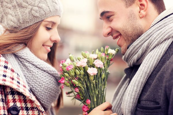 five great sober date ideas - happy couple with flowers