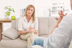 woman discussing with her therapist - Fair Oaks Recovery Center - intensive outpatient treatment for drug and alcohol addiction - partial hospitalization program (PHP) - addiction treatment center, day treatment 