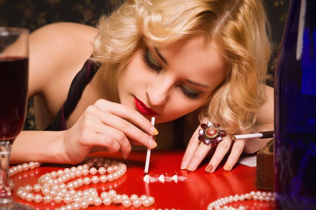 rich blonde woman using cocaine