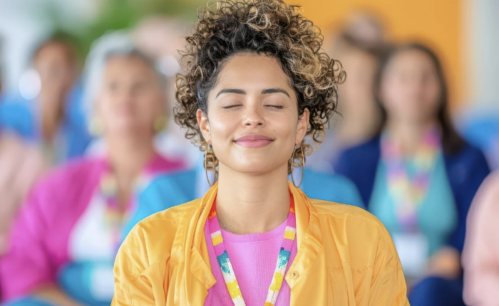 A group of people meditating.